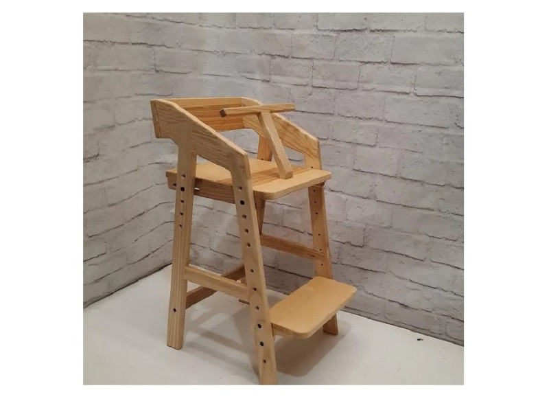 Growing chair for children with a limiter